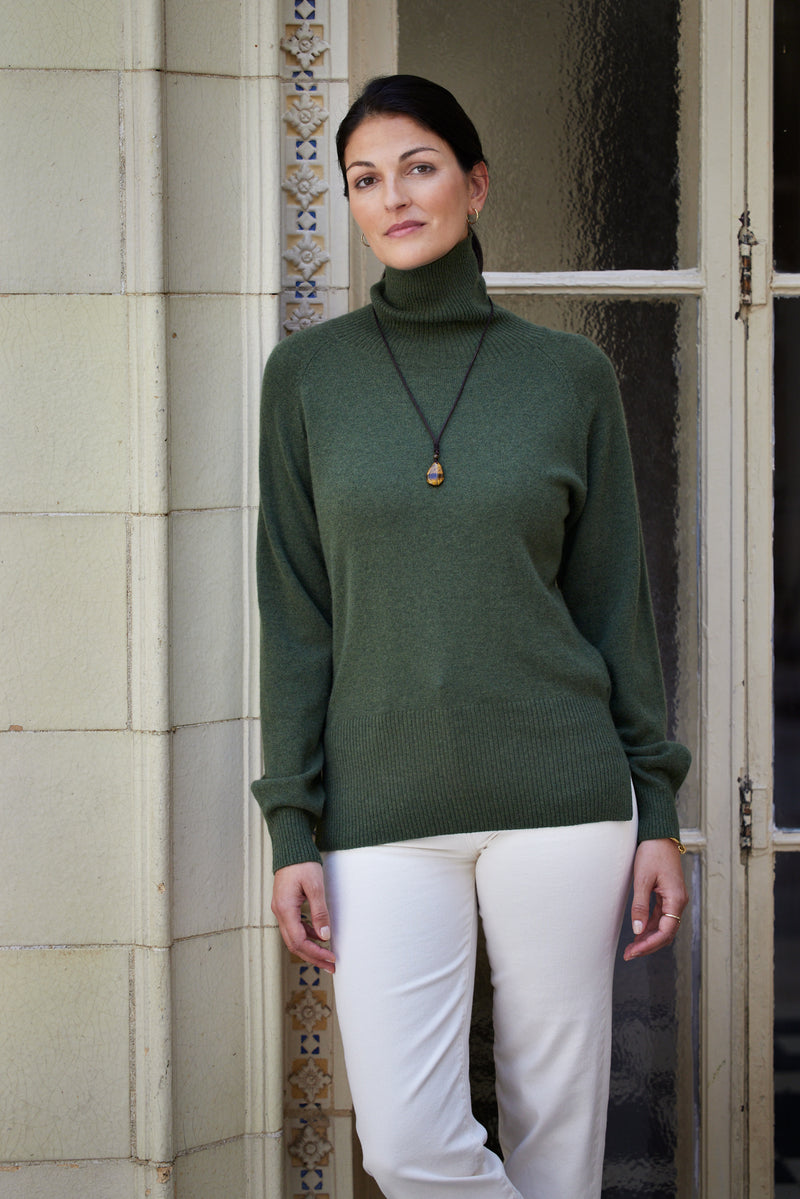 Women's Cinzia Turtle Neck Cashmere Sweater in Olive with stone pants