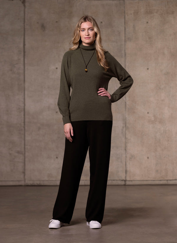 Women's Cinzia Turtle Neck Cashmere Sweater in Olive featuring our cashmere wide leg pant in black
