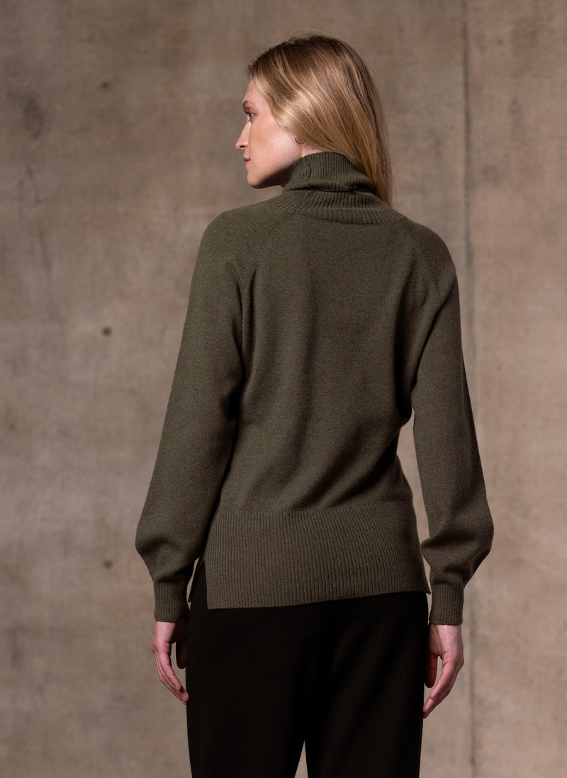 back image of Women's Cinzia Turtle Neck Cashmere Sweater in Olive featuring our cashmere wide leg pant in black
