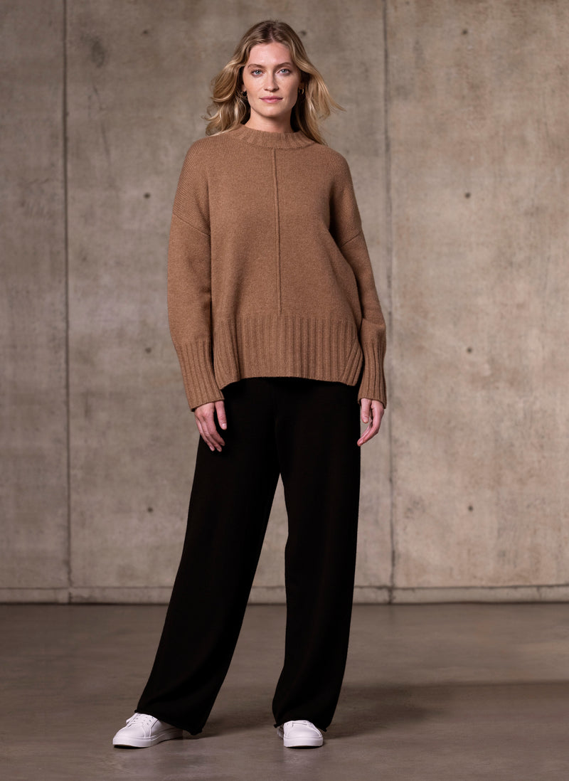 Women's Alessandra Mock Neck Knitted Cashmere Sweater in Camel featuring our luxurious cashmere wide leg pant