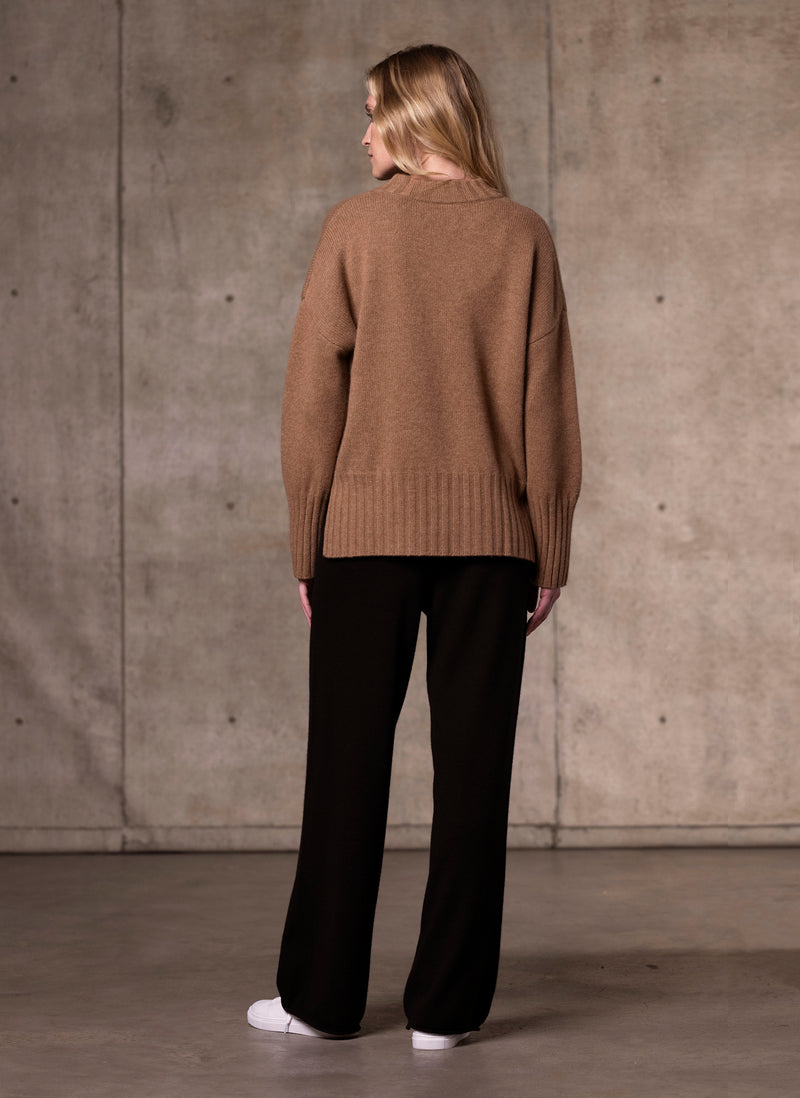 Black image of Women's Alessandra Mock Neck Knitted Cashmere Sweater in Camel featuring our luxurious cashmere wide leg pant