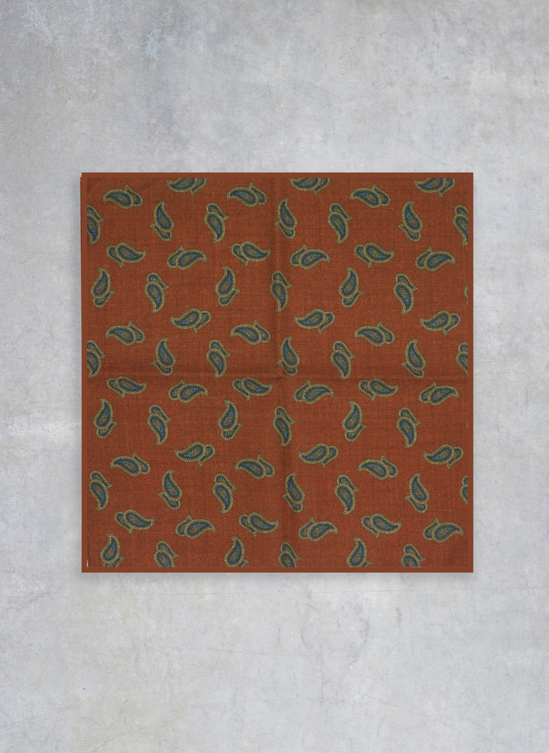 flat lay of Men's Paisley Wool Pocket Square in Rust