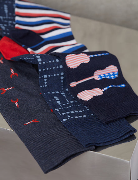 Grouping of Dots in Navy Sock, Spaceships sock in navy and American Guitar Sock in Navy