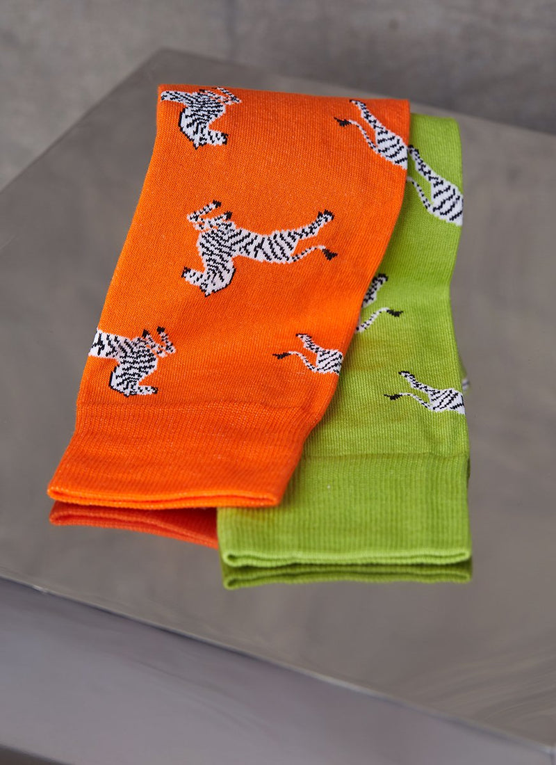 Group image of Large Zebra Sock in Green and another sock in Large Zebra Sock in Orange