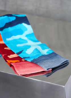 Grouping of Camo Sock in Teal and Camo Sock in Red