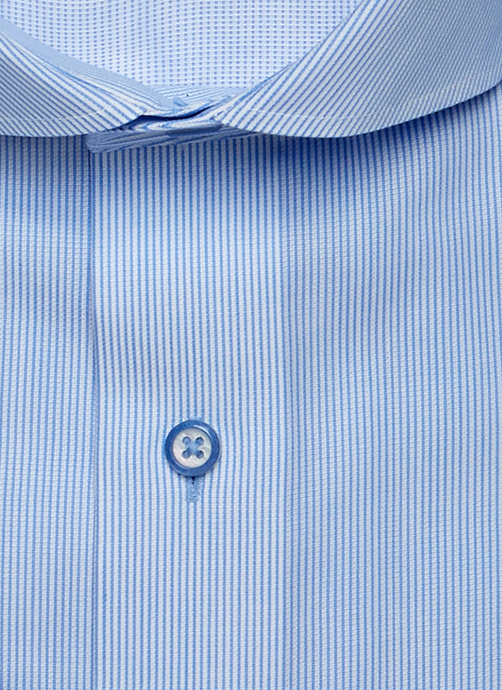 blue button on blue stripe shirt