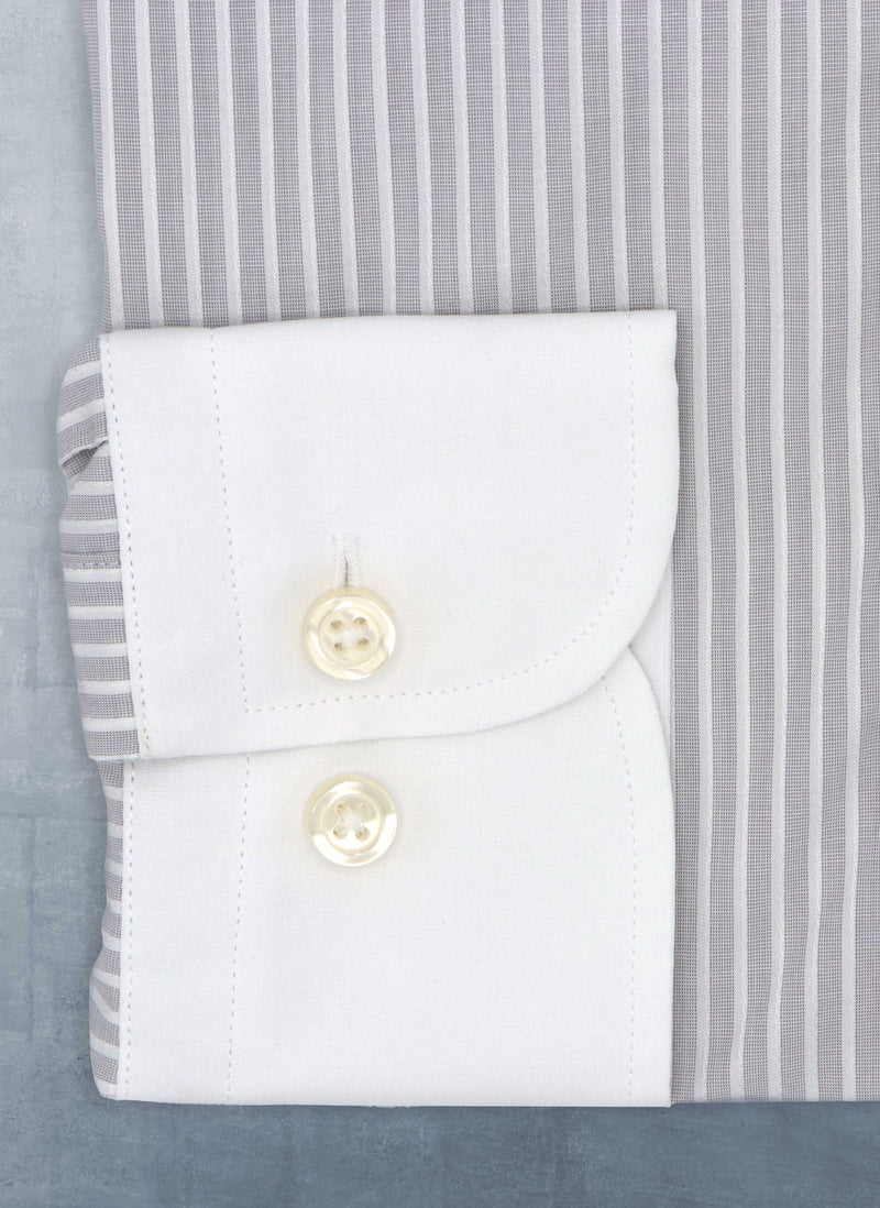 cuff detail with white buttons of grey and white stripe shirt
