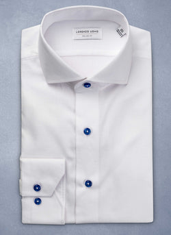 white shirt with contrast navy buttons
