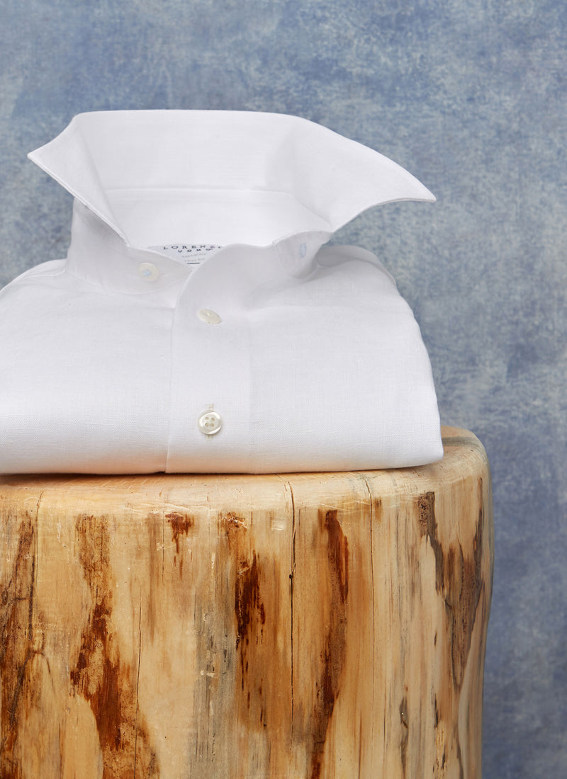 white linen shirt on stool