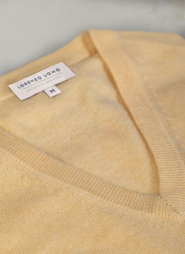 angle detailed image of our v-neck cashmere sweater in yellow