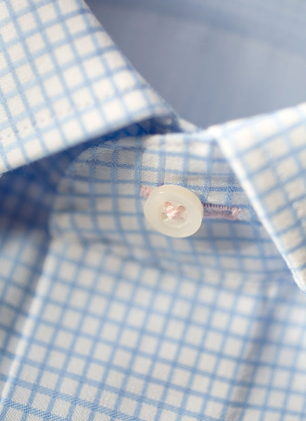 light blue windowpane shirt with light pink button hole and thread