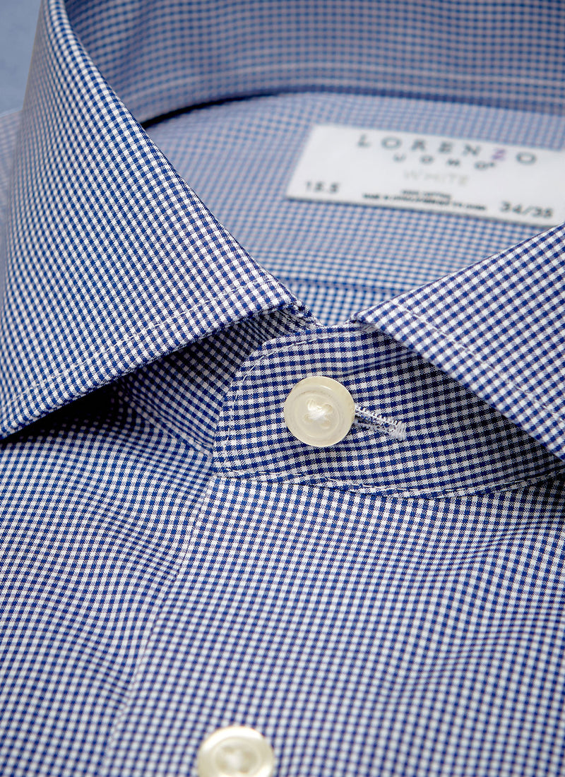 collar of navy gingham shirt with white buttons and threads