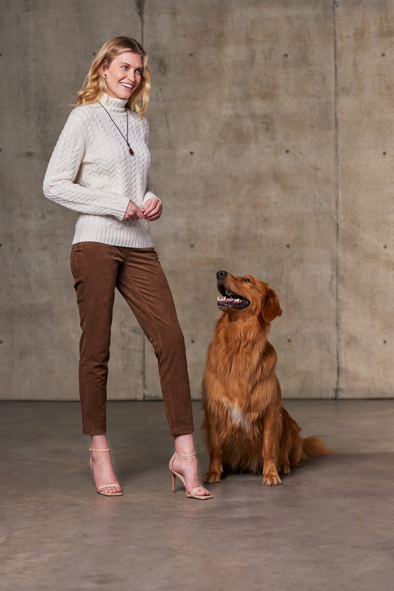 Women's Giulia Turtle Neck Cable Cashmere Sweater in Ivory with dog