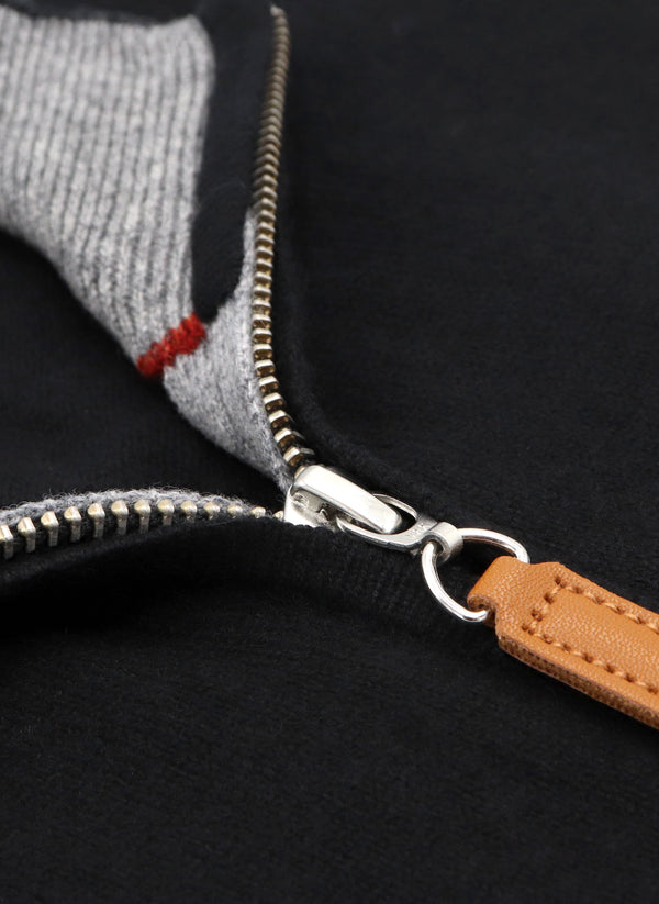 close up image of black quarter zip cashmere sweater in black with ykk zipper