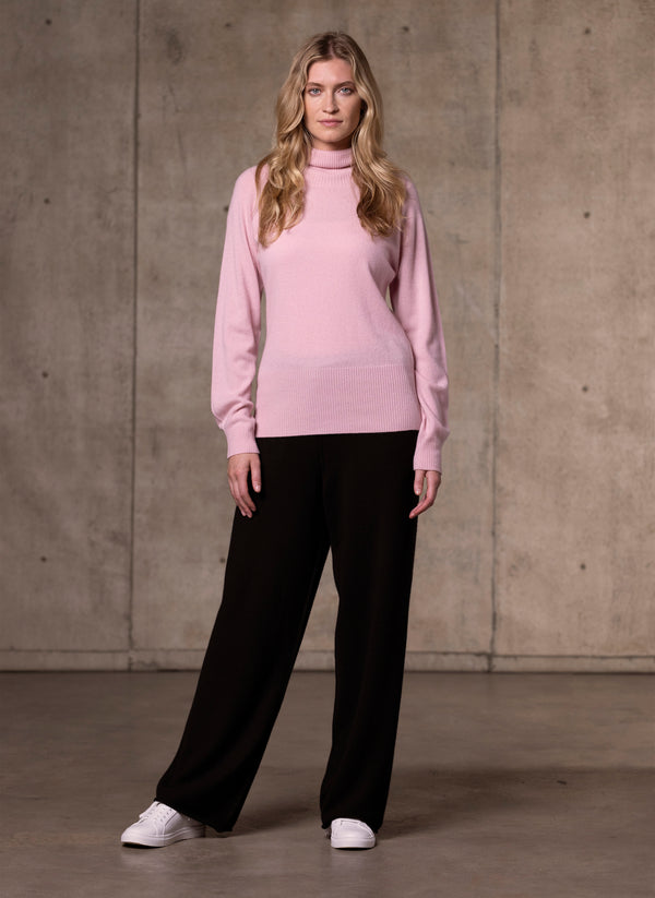 Women's Cinzia Turtle Neck Cashmere Sweater in Light Pink featuring our luxurious cashmere wide leg pants in black
