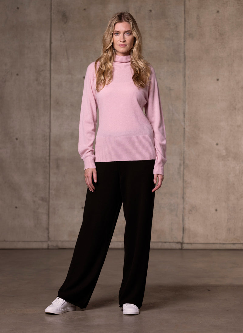 Women's Cinzia Turtle Neck Cashmere Sweater in Light Pink featuring our luxurious cashmere wide leg pants in black