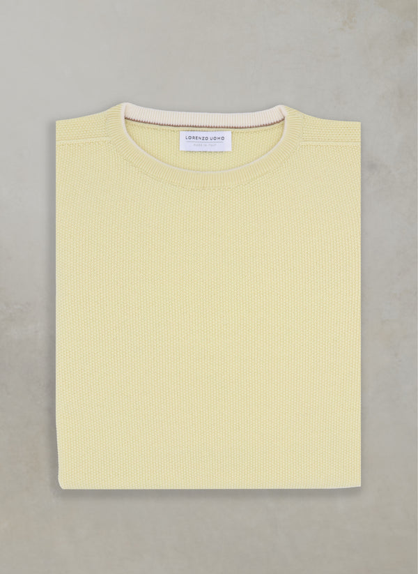 flay lay image of 100% merino wool crew neck sweater in yellow