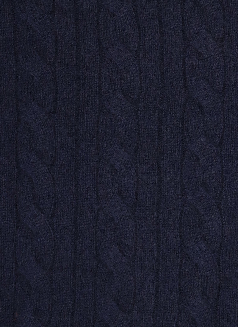 luxurious fabric detail in a navy tennis v-neck cashmere sweater