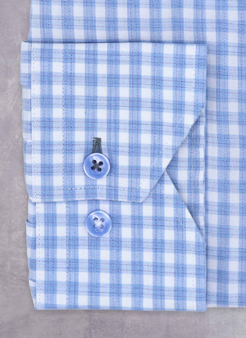 Alexander in Dusty Blue Check Shirt with one contrast button hole and button thread at cuff