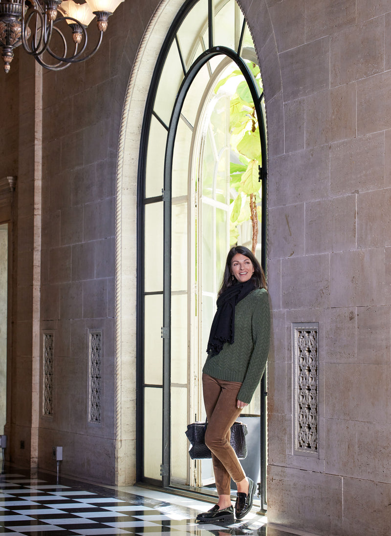 Women's Giulia Turtle Neck Cable Cashmere Sweater in Olive with black handbag and black scarf