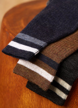Grouping of Merino Wool Collegiate Rib Sock in Heather Charcoal and Merino Wool Collegiate Rib Sock in Heather  Blue