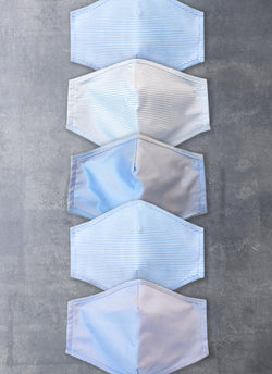 Products The Essential Everyday Non-Medical Masks (Assorted Pack of 5) Contains one mask with micro check pattern in Blue and White, also contains one mask with solid pattern in Medium Blue, also contains one mask with stripe pattern in Medium Blue and white, also contains one mask with stripe pattern in Light Blue and White, also contains one mask with stripe pattern in Light Blue and White