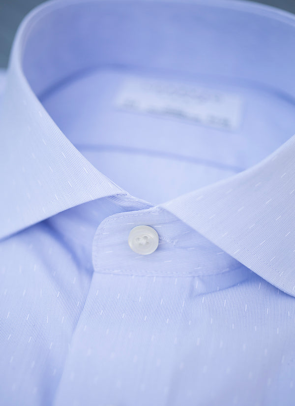 collar detail of blue dash shirt with white buttons