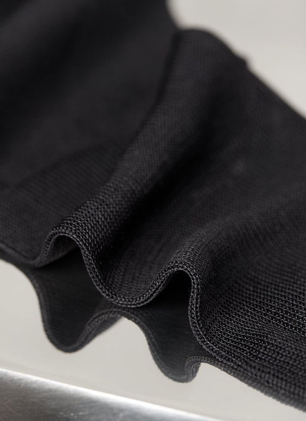 detailed close up of tuxedo over the calk silk sock