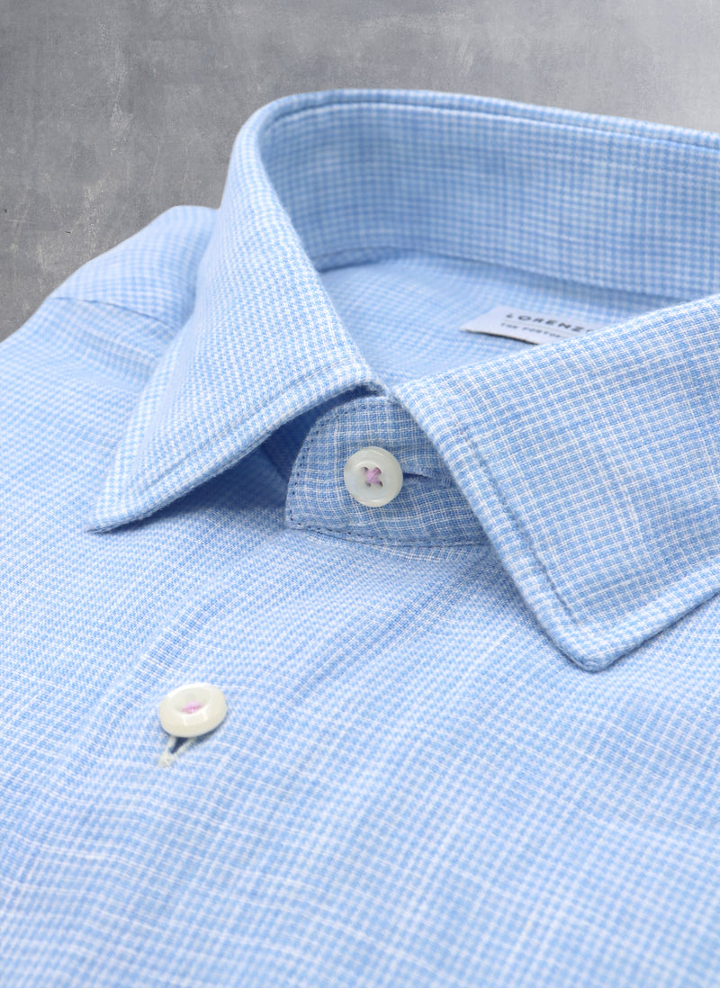 light blue gingham collar with white buttons and purple button threads