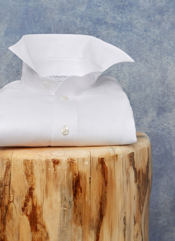 white linen shirt on stool