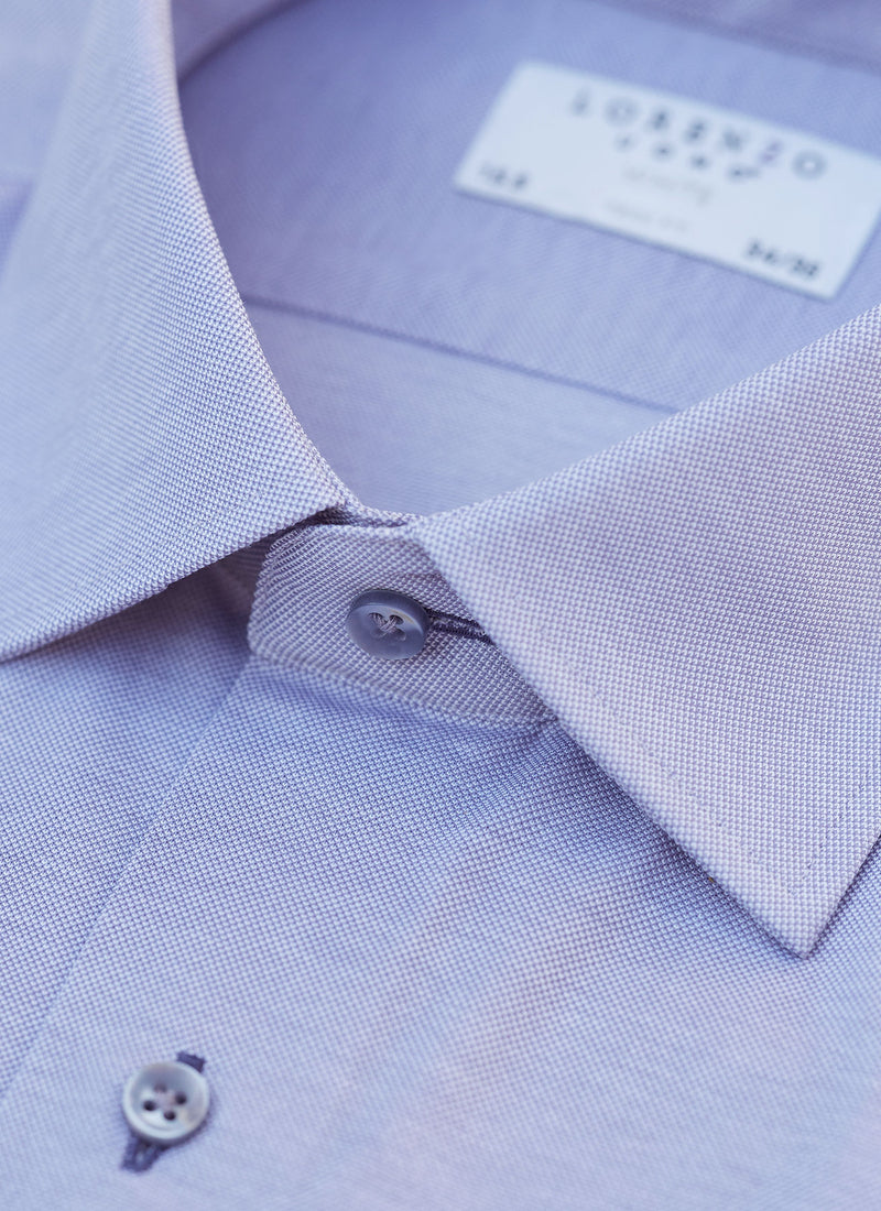 collar detail of periwinkle knit shirt