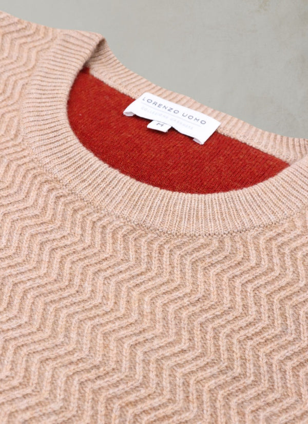 collar detail image of our men's dolomite cashmere herringbone sweater in tonal camel with contract cinna inside of the collar.