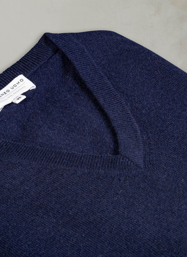 angle close up image of our men's cashmere v-neck sweater in navy blue
