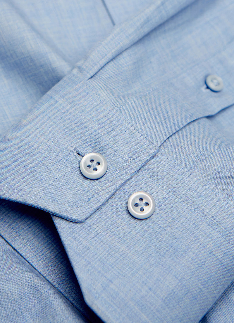 cuff detail of Alexander in Heather Blue Shirt with light blue buttons