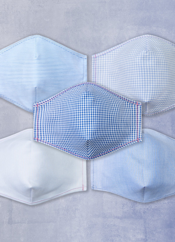 Oxford Non-Medical Masks (Assorted Pack of 5) Contains one mask with Gingham pattern in Blue and White, also contains one mask with Gingham pattern in Dark Blue and White, also contains one mask with microcheck pattern in Blue and White, also contains one mask with microcheck pattern in Light Blue and White, also contains one mask with stripe pattern in Light Blue and White