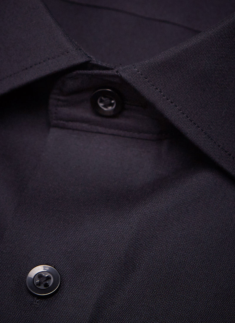 detailed collar of a black poplin dress shirt