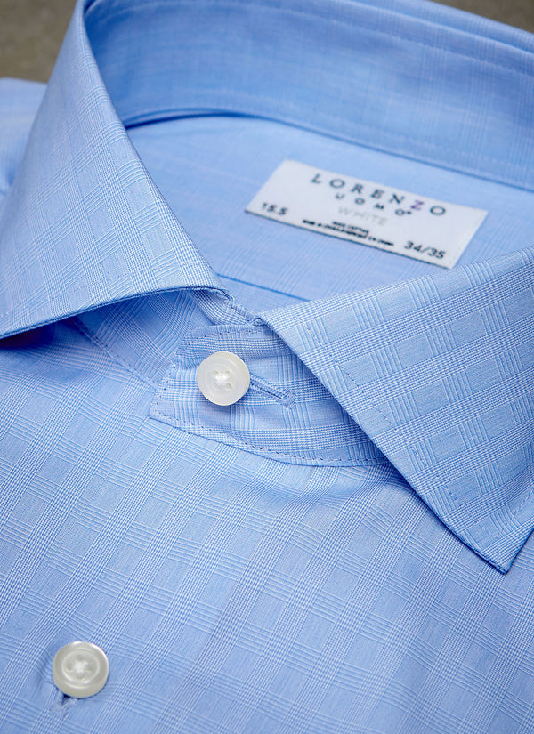collar detail of blue glen plaid shirt with white buttons and button thread