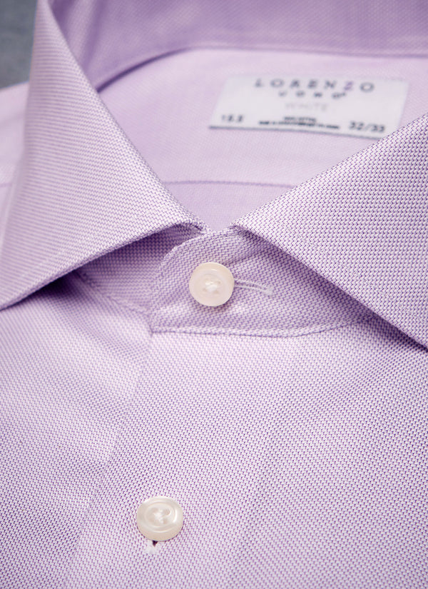 collar detail of textured purple shirt with white buttons