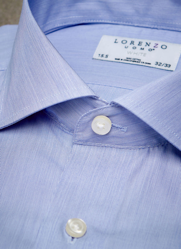 collar detail of blue micro stripe shirt with blue buttons 