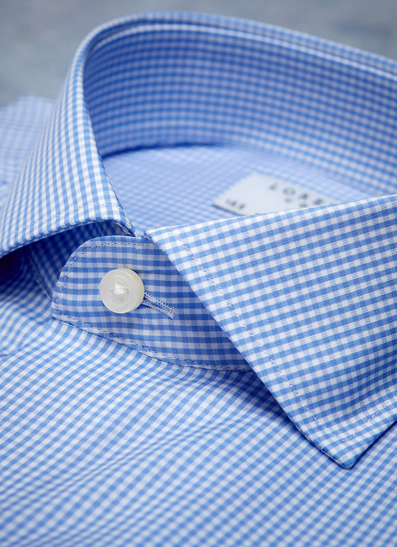 collar of light blue gingham shirt