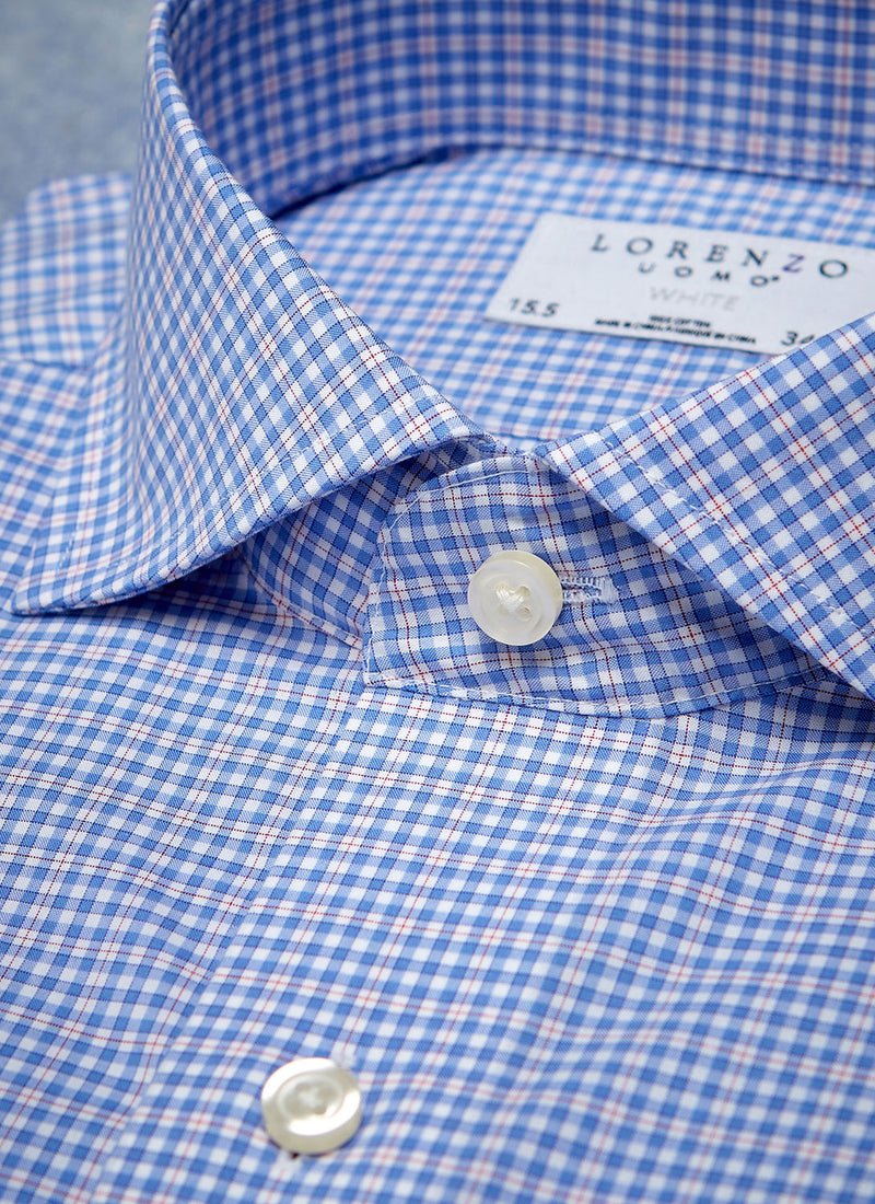 collar detail of blue and red multicheck shirt with white buttons, button holes and buttons threads
